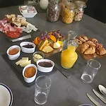 Vendégház The Lions Den - La Loge